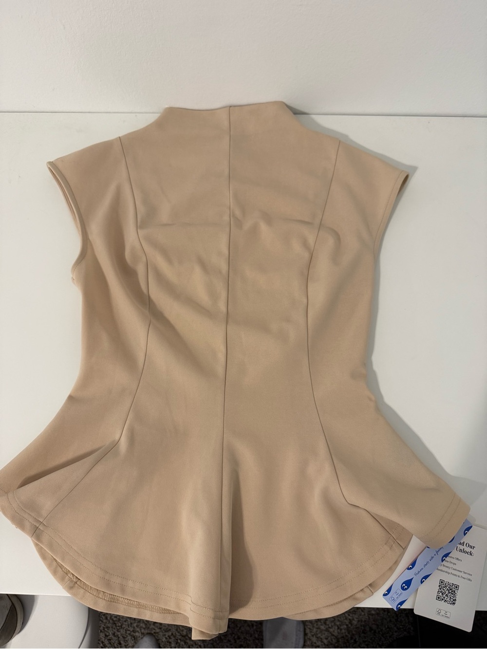 Cider Beige Sleeveless Peplum Top